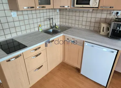 Kitchen; kitchen appliances, tile floor, renovated, natural light