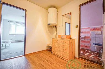 Bathroom; water heater, wood floor, tile floor, natural light