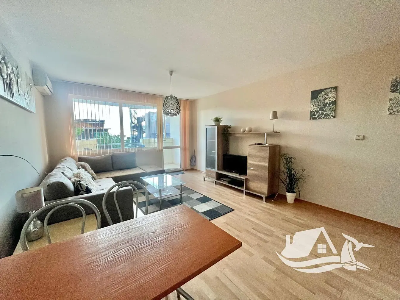 Living room; view, natural light, modern style, wood floor