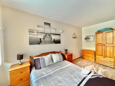 Bedroom; wood floor, natural light, modern style