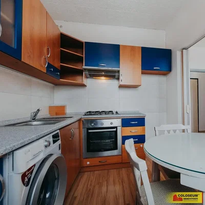 Kitchen; kitchen appliances, tile floor, wood floor, renovated, natural light