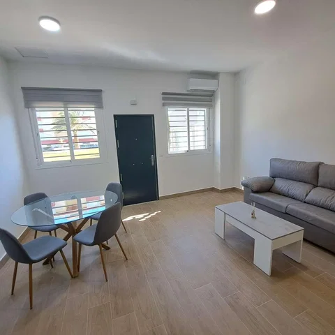 Living room; tile floor, natural light, modern style