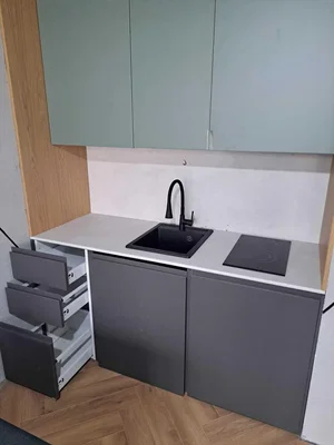 Kitchen; kitchen appliances, wood floor, renovated