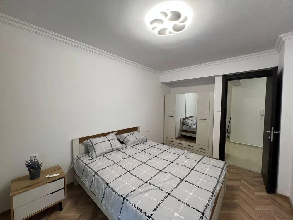 Bedroom; natural light, wood floor, modern style