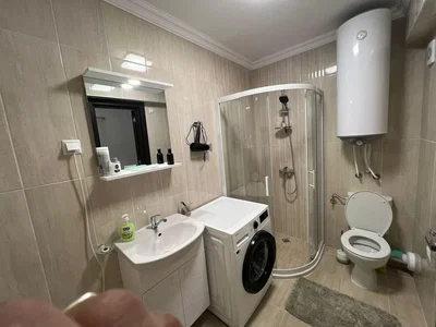 Bathroom; tile floor, water heater, renovated, natural light
