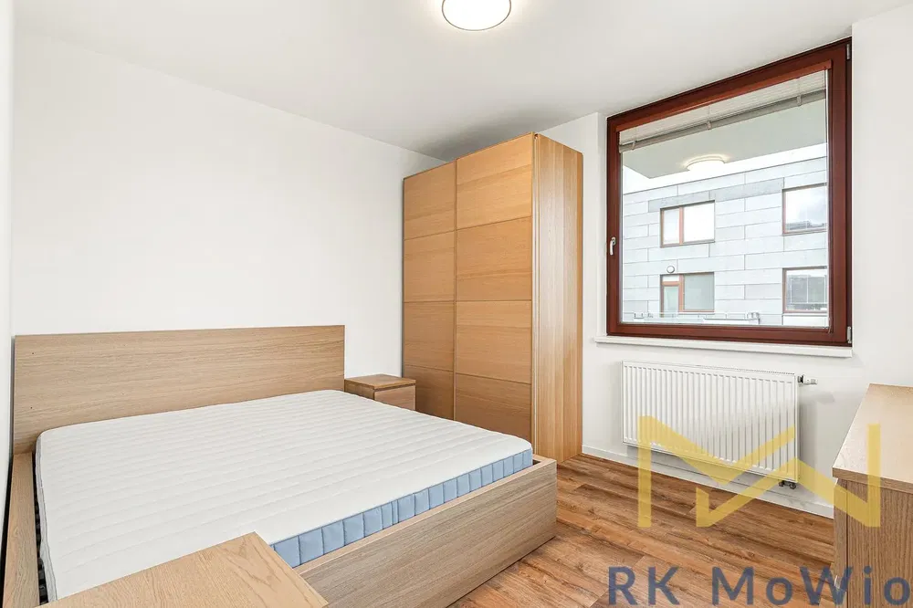 Bedroom; wood floor, natural light, modern style