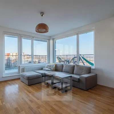 Woonkamer; uitzicht, houten vloer, natuurlijk licht, moderne stijl