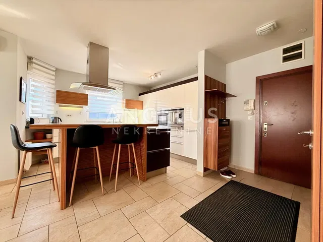 Kitchen; kitchen appliances, tile floor, natural light