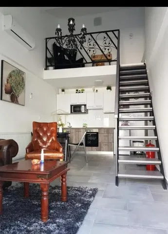 Living room; modern style, tile floor, natural light
