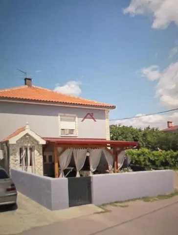 House and surroundings