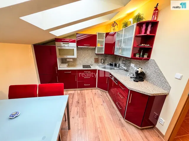 Kitchen; kitchen appliances, wood floor, natural light, modern style