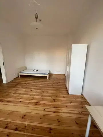 Bedroom; wood floor, natural light