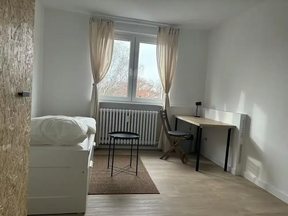 Bedroom; natural light, wood floor