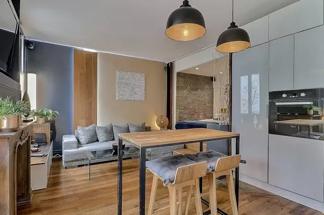 Living room; wood floor, modern style, natural light, kitchen appliances