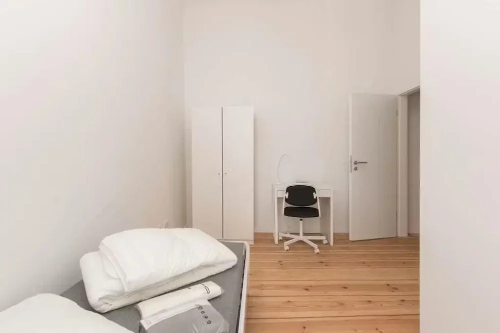 Bedroom; wood floor, natural light