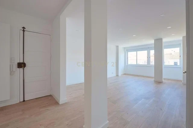 Living room; wood floor, natural light, renovated