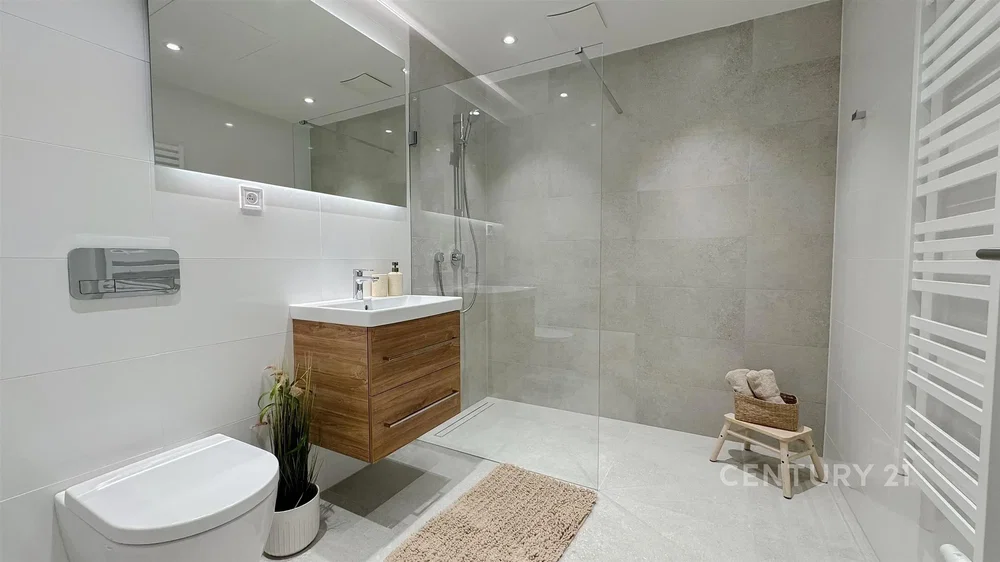 Bathroom; tile floor, renovated, natural light, modern style