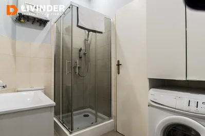 Bathroom; tile floor, natural light, renovated, water heater