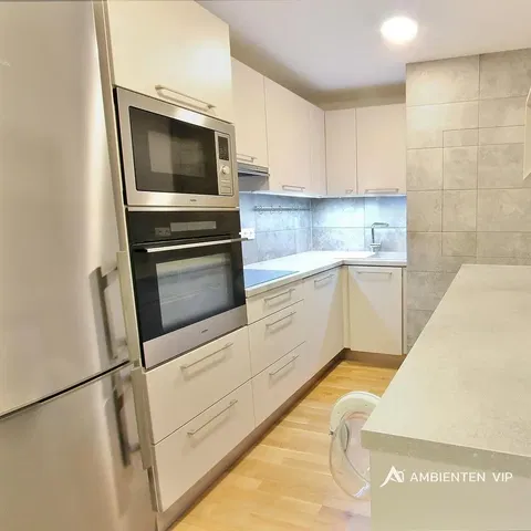 Kitchen; kitchen appliances, wood floor, renovated, natural light