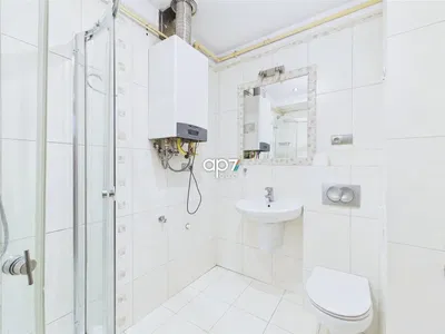 Salle de bain; carrelage, chauffe-eau