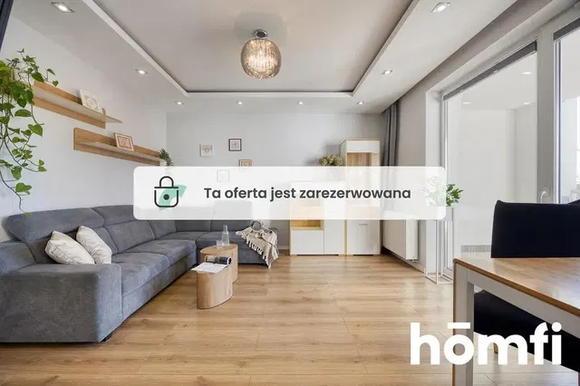 Soggiorno; pavimento in legno, luce naturale, stile moderno