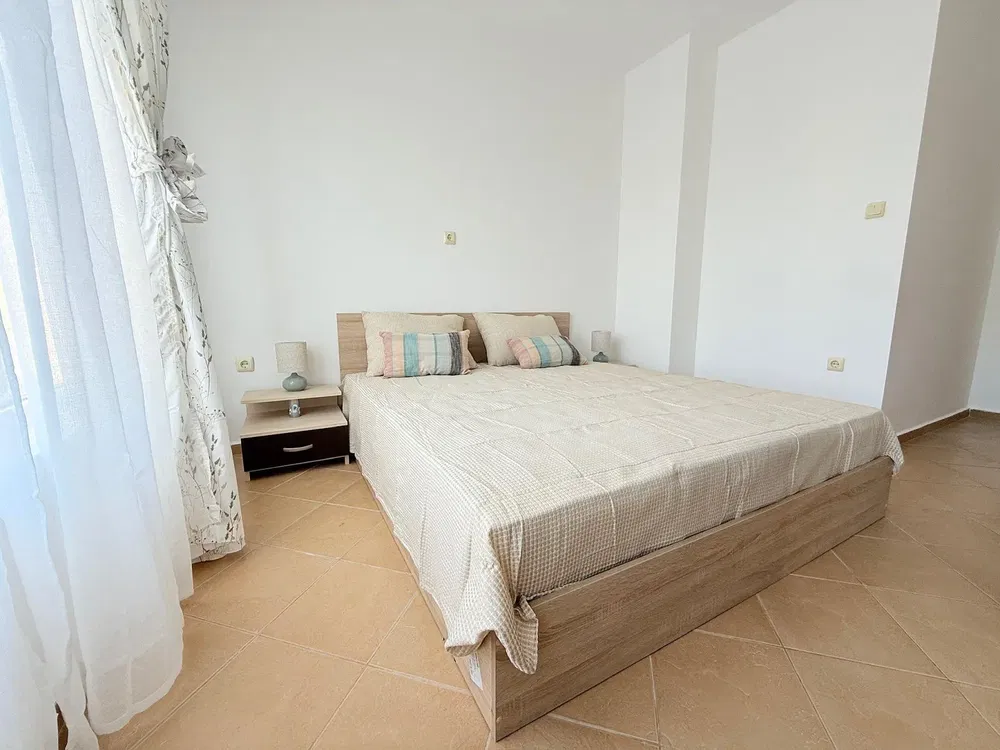 Bedroom; tile floor, natural light