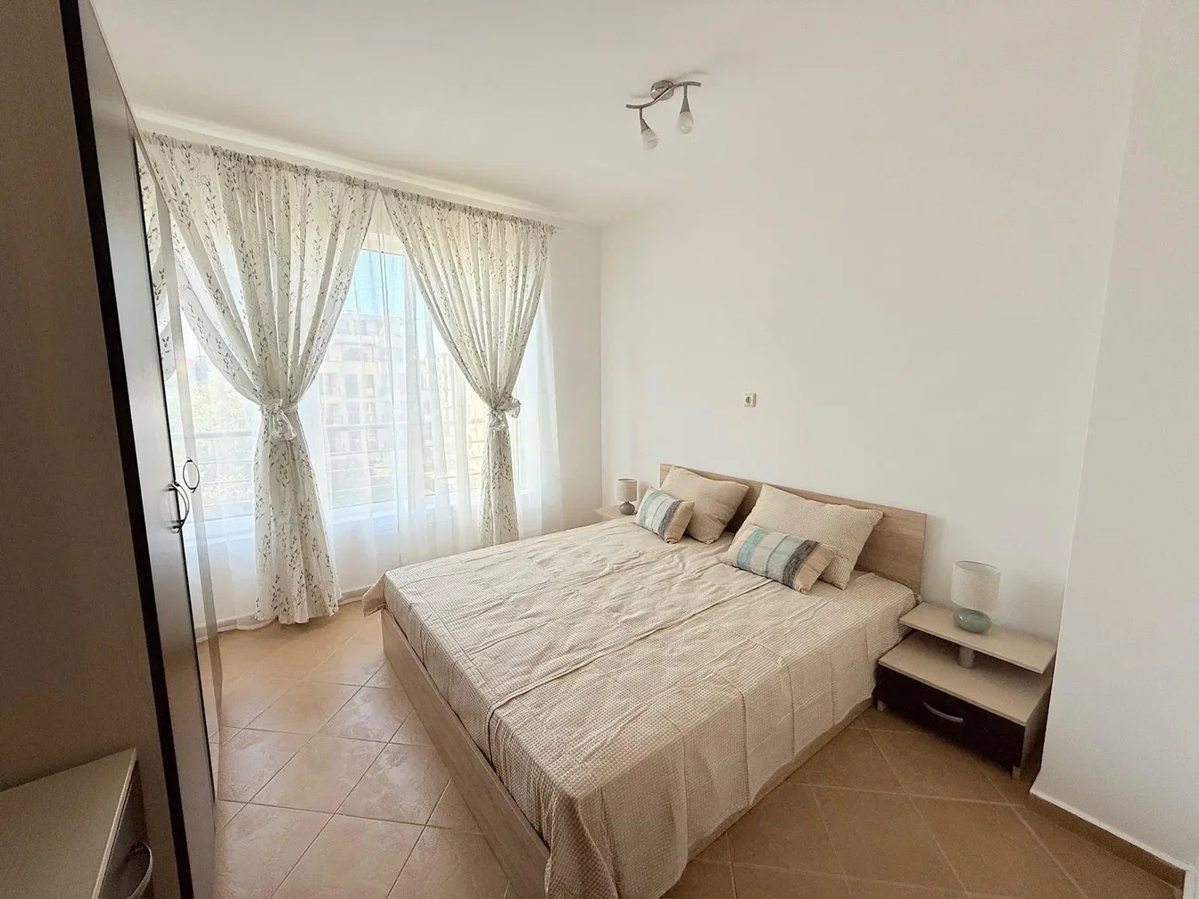 Bedroom; natural light, tile floor