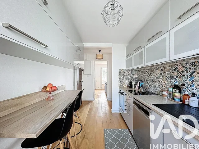 Kitchen; kitchen appliances, natural light, modern style, wood floor, tile floor