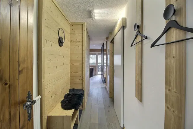 Cloakroom; wood floor, wood beams, natural light, rustic style