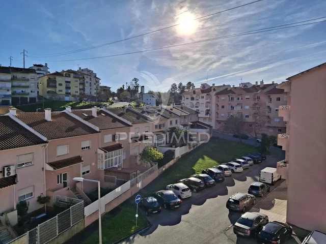 House and surroundings; view