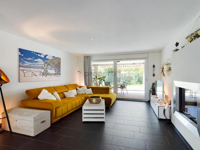 Living room; tile floor, fireplace, natural light, modern style