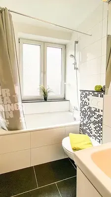 Koupelna; dlažba, přirozené světlo, po rekonstrukci