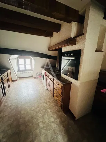 Kitchen; wood beams, tile floor