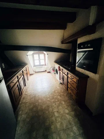 Kitchen; kitchen appliances, tile floor, natural light
