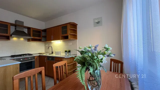Kitchen; kitchen appliances, tile floor, natural light, modern style