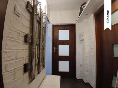Vestiaire; parquet, lumière naturelle