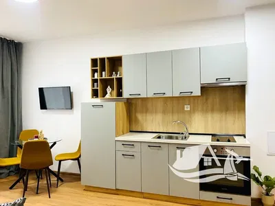 Kitchen; kitchen appliances, modern style, natural light, wood floor