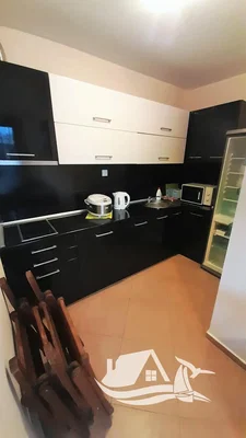 Kitchen; kitchen appliances, tile floor, renovated, natural light, modern style