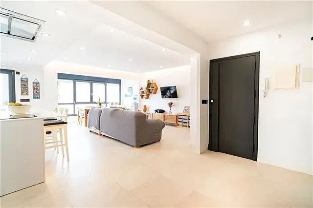 Living room; natural light, tile floor, modern style