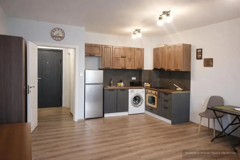 Cucina; elettrodomestici, pavimento in legno, luce naturale, stile moderno