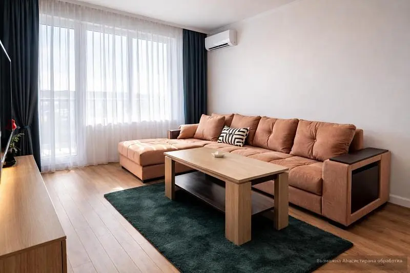 Soggiorno; luce naturale, pavimento in legno, stile moderno