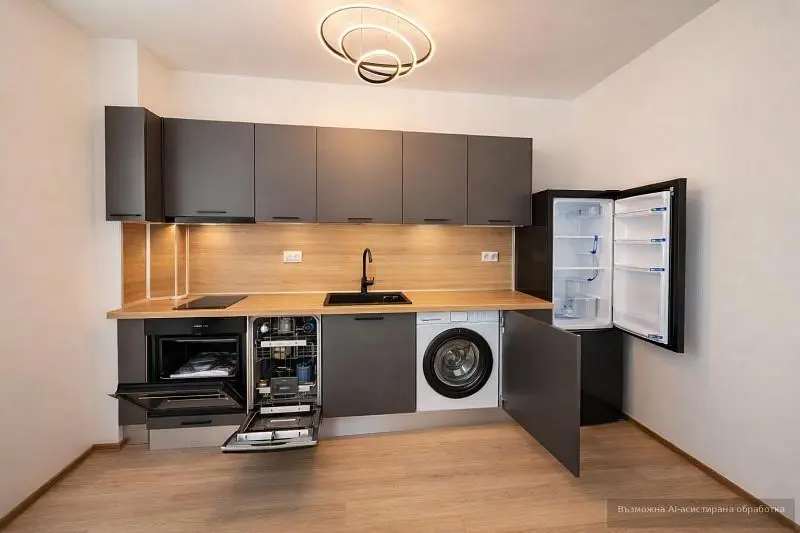 Cucina; elettrodomestici, luce naturale, stile moderno, pavimento in legno