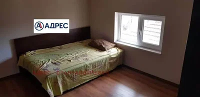 Camera da letto; luce naturale, pavimento in legno