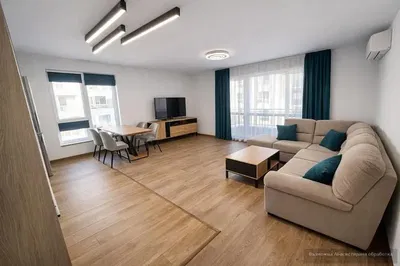 Soggiorno; luce naturale, pavimento in legno, stile moderno