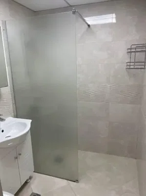 Koupelna; dlažba, přirozené světlo, po rekonstrukci