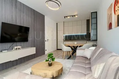 Soggiorno; stile moderno, pavimento in legno, luce naturale