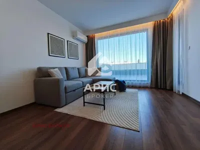 Soggiorno; pavimento in legno, luce naturale, stile moderno