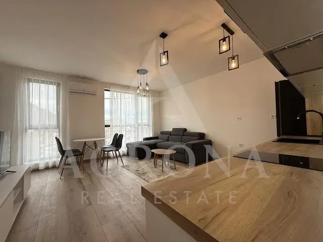 Soggiorno; vista, pavimento in legno, luce naturale, stile moderno