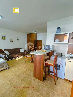 Obývací pokoj; dlažba, kuchyňské spotřebiče