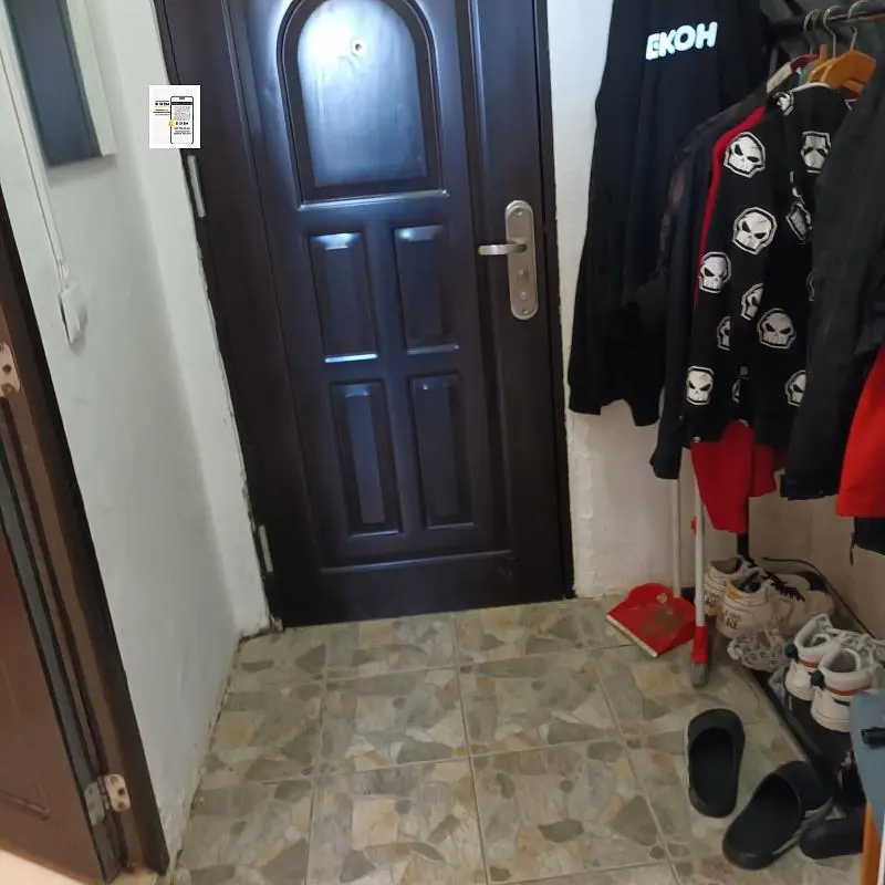 Cloakroom; tile floor, needs renovation